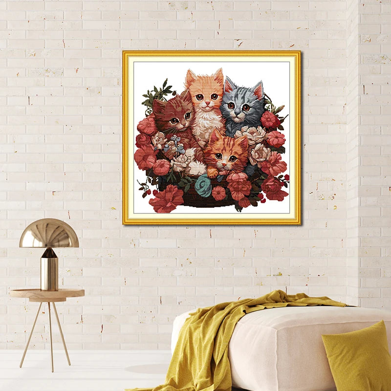 Gatinhos na coroa de flores
